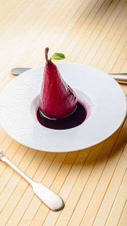 pear in sweet wine sauceの写真素材