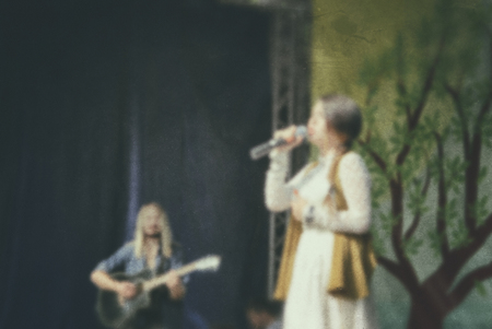 Actor skill - performance people on stage. Blurred background-scenario art. Retro photo.の写真素材