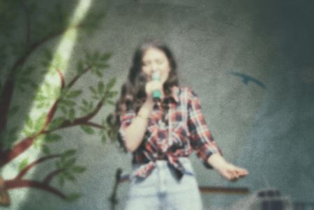 Actor skill - performance people on stage. Blurred background-scenario art. Retro photo.の写真素材