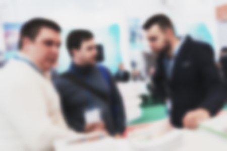blurred background with groups of business people at presentationの写真素材