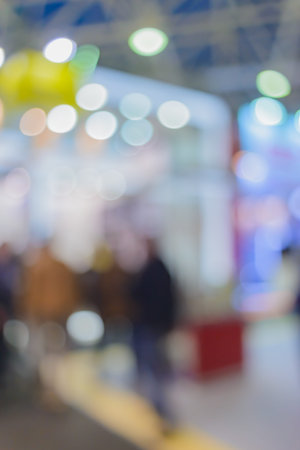 Blurred background. Business people in interiors, exhibitions a variety of lighting. Filmed with a special lens to produce bokeh.の写真素材