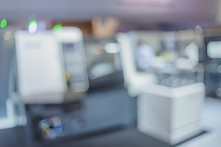 Blurred background the industrial exhibition - wonderful bokeh of light sources.の写真素材