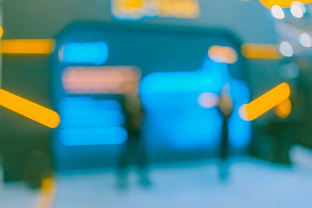 Blurred background- abstract bokeh of light sources. Industrial exhibition- equipment, devices and tools for metalworking industry.の写真素材