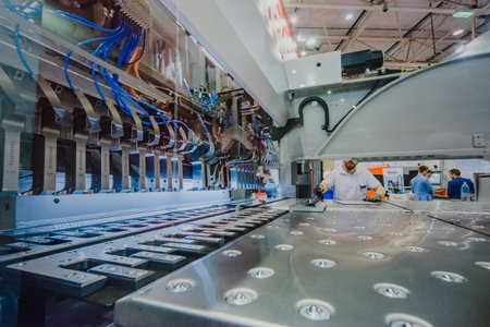 MOSCOW, RUSSIA, Expocentre - MAY 15-19, 2017: 18th international specialized exhibition "Equipment, instruments and tools for Metalworking industry". Booth display company. People - visitor event expo.のeditorial素材