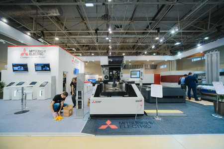 MOSCOW, RUSSIA, Expocentre - MAY 15-19, 2017: 18th international specialized exhibition "Equipment, instruments and tools for Metalworking industry". Booth display company. People - visitor event expo.のeditorial素材