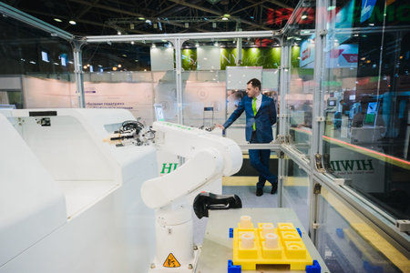 MOSCOW, RUSSIA, Expocentre - MAY 15-19, 2017: 18th international specialized exhibition "Equipment, instruments and tools for Metalworking industry". People conduct business meetings at booths productのeditorial素材