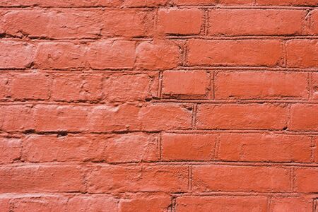 Brick wall  background. Use as design element of residential and office interiors, rough, cracked roughness, the weathered masonry. Architecture abstract pattern.の写真素材