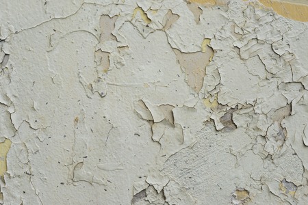 Abstract texture of plaster surface used in design projects of premises. The wall background is the result of exposure to the environment- rain and time.の写真素材