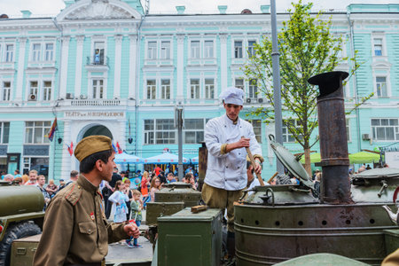 MOSCOW, RUSSIA - June 1-12, 2017: International festival "Times and epochs. The meeting". Field kitchen - cooking food for visitors to the showのeditorial素材