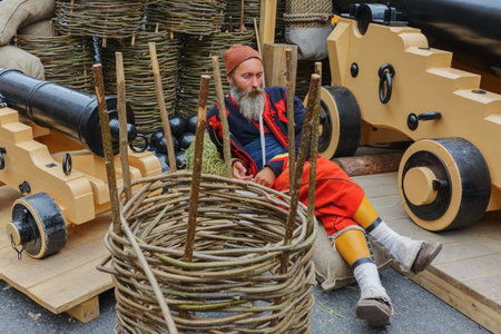 MOSCOW, RUSSIA - June 1-12, 2017: International festival "Times and epochs. The meeting". Reconstruction of the historical era soldiers gunner on vacationのeditorial素材
