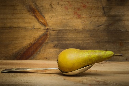 Still life pear. Wooden background- autumn nature. Abstract scene for drawing objectsの写真素材