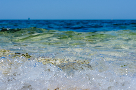 The sea and stones. Splashing waves- summer landscape. Seascape background.の写真素材