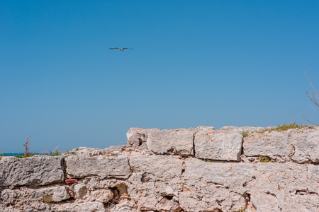 Old ruins of a brick- stone walls of the ancient city. National archaeological park.の写真素材