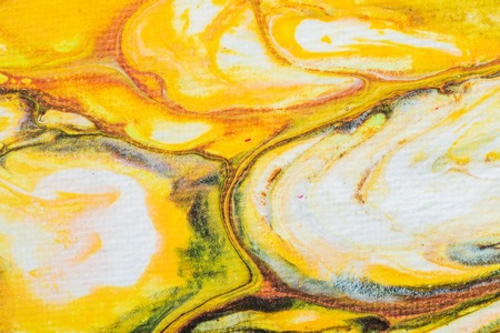 Fluid art. Abstract illustration - stain, splashes, smearing the dye. Liquid acrylic- paint on canvas. Pigment water background.の写真素材