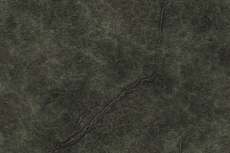 Stamping on metal- oxidized copper plate. Abstract drawing on the surfaceの写真素材