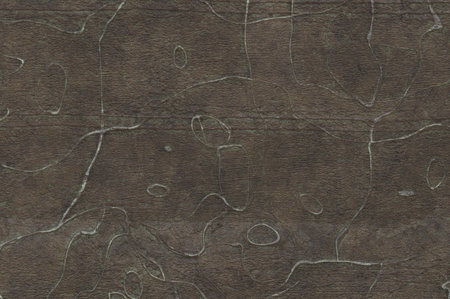 Stamping on metal- oxidized copper plate. Abstract drawing on the surface