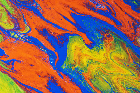 Fluid art. Abstract illustration - stain, splashes, smearing the dye. Liquid acrylic- paint on canvas. Pigment water background.の写真素材
