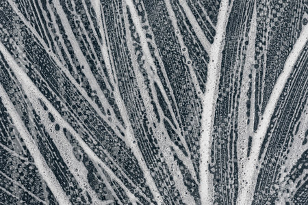 Texture liquid soap- drawing technique. Art fluid paint- cleansing wash. Creating abstract work-...