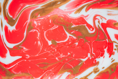 Fluid art. Abstract illustration - stain, splashes, smearing the dye. Liquid acrylic- paint on canvas. Pigment water background.の写真素材
