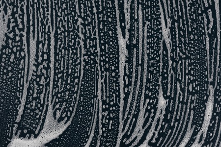 Drops- liquid foam. Fluid aqua- pattern nature. Background- cleansing wash. Shampoo bubbles- soapy waterの写真素材