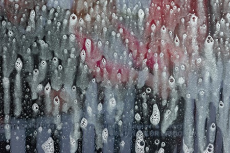 Background wet- raindrop realistic. Water splash shower- bad weather. Window- soap foam. Rainwater- liquid splash abstractの写真素材