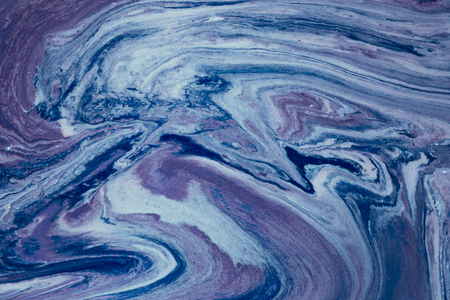 Fluid art- color motion. Abstract inks stain, splashes, smearing the dye. Liquid acrylic- pigment water backgroundの写真素材