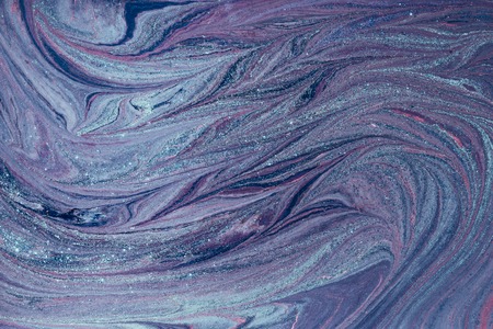 Fluid art- marbled effect. Abstract artwork- stain, splashes, smearing the dye. Liquid acrylic- color blot. Pigment water backgroundの写真素材