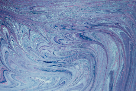 Fluid art- marbled effect. Abstract artwork- stain, splashes, smearing the dye. Liquid acrylic- color blot. Pigment water backgroundの写真素材