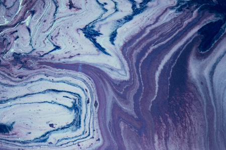 Fluid art- marbled effect. Abstract artwork- stain, splashes, smearing the dye. Liquid acrylic- color blot. Pigment water backgroundの写真素材