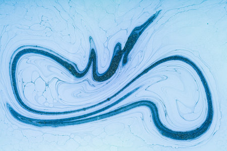 Fluid art- marbled effect. Abstract artwork- stain, splashes, smearing the dye. Liquid acrylic-...
