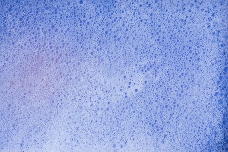 Drops- liquid foam. Fluid aqua- abstract pattern nature. Background- cleansing wash. Shampoo bubbles- soapy waterの写真素材