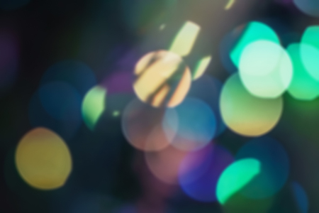 Background abstract- bokeh blurry. Defocused- festive party. New Year- beautiful spark.の写真素材