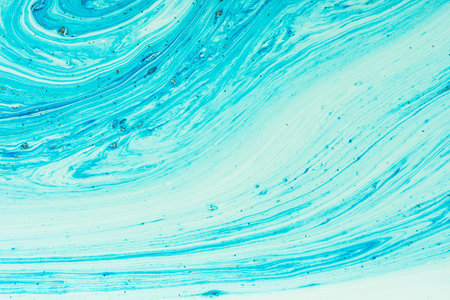 Fluid art- marbled effect. Abstract artwork- stain, splashes, smearing the dye. Liquid acrylic-...