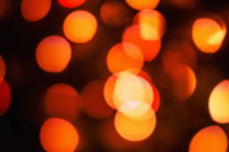 Background abstract- bokeh blurry. Defocused- festive party. New Year- beautiful spark.の写真素材