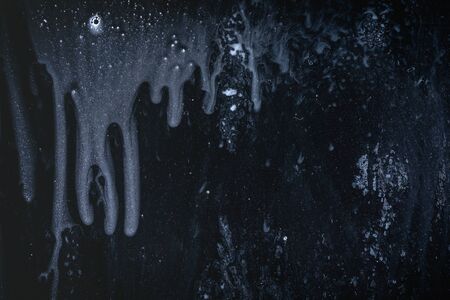 Drops- liquid foam. Fluid aqua- abstract pattern nature. Background- cleansing wash. Shampoo bubbles- dish soap. Nature beauty- view topの写真素材