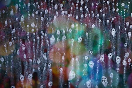 Drops- liquid foam. Fluid aqua- abstract pattern nature. Background- cleansing wash. Shampoo bubbles- dish soap. Nature beauty- view topの写真素材