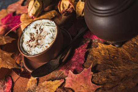 Still life- dark food photo. Coffee mug and sweets on a black backgroundの写真素材