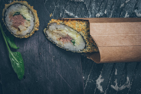 Still life. Japanese cuisine- roll in a package. Flat layの写真素材