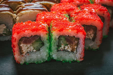 Sushi- delicious food. Dark style- low key photographyの写真素材