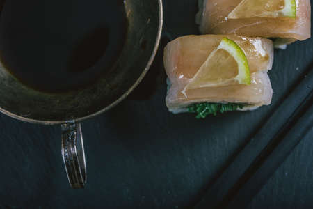 Sushi- delicious food. Dark style- low key photographyの写真素材