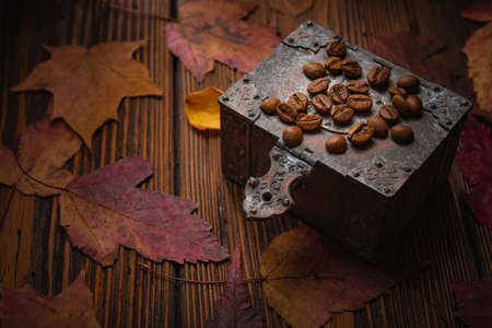 Still life- autumn motif. The coffee storage box is on the tableの写真素材