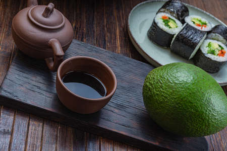 Japanese sushi - fast food. Asian traditional snack. Preparing healthy snackの写真素材