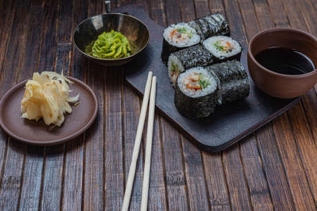 Japanese sushi - fast food. Asian traditional snack. Preparing healthy snackの写真素材