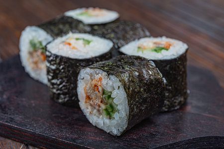 Japanese sushi - fast food. Asian traditional snack. Preparing healthy snackの写真素材