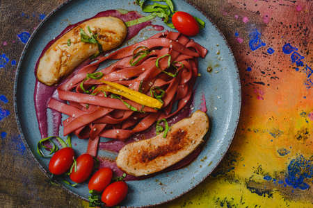 Sausage top view. Flat lay background - rustic food. Breakfast traditional.の写真素材