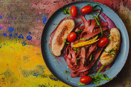 Sausage top view. Flat lay background - rustic food. Breakfast traditional.の写真素材