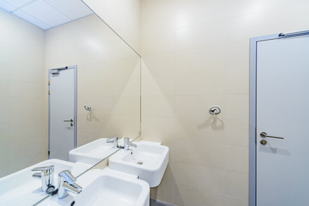 Office move concept - toilet room in the office center. Closet-restroom interior