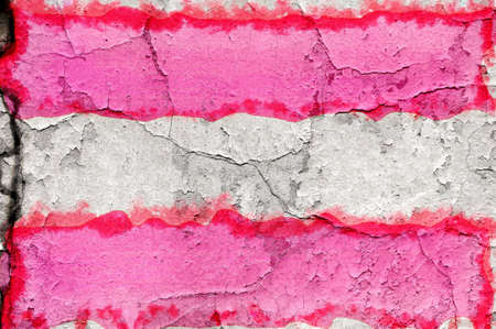 The national flag of the country is painted on a brick wall - graffiti. Exterior weathered backgroundの写真素材