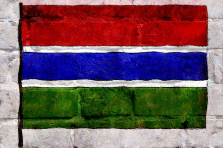 The national flag of the country is painted on a brick wall - graffiti. Exterior weathered backgroundの写真素材