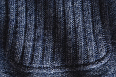 Blue knitted fabric as a background. Close-up image.の写真素材